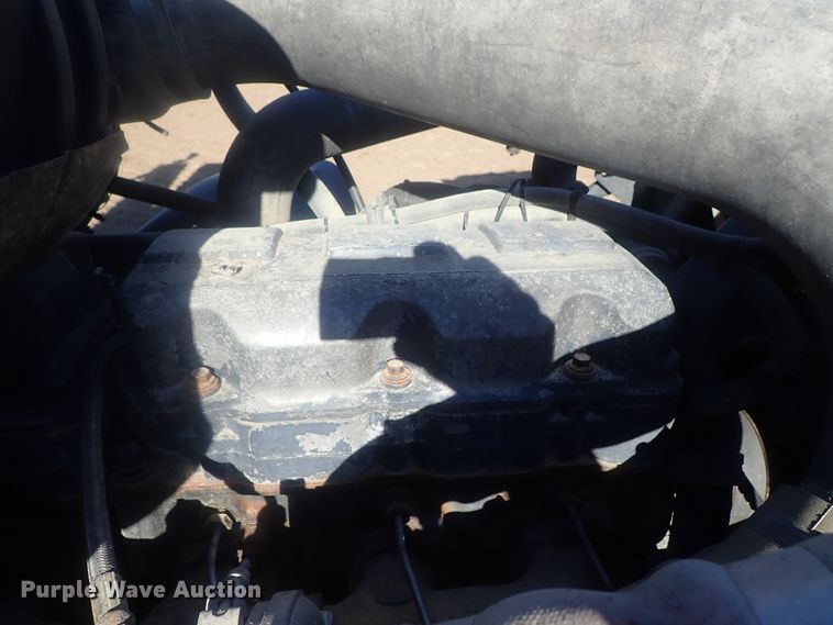 image for item DI7354 2003 Mack CV713  roll-off container truck