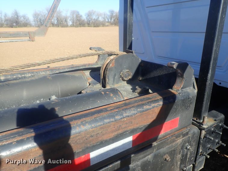 image for item DI7354 2003 Mack CV713  roll-off container truck