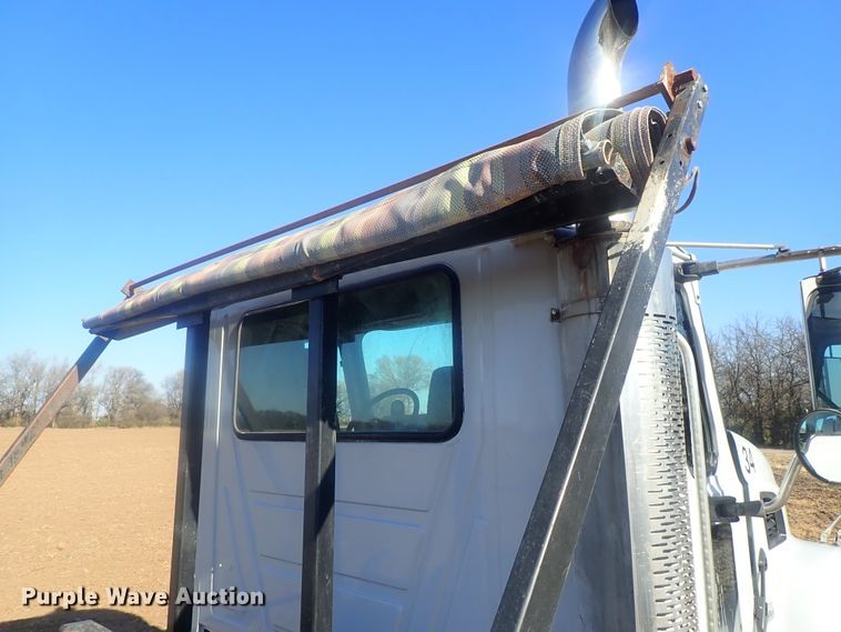 image for item DI7354 2003 Mack CV713  roll-off container truck