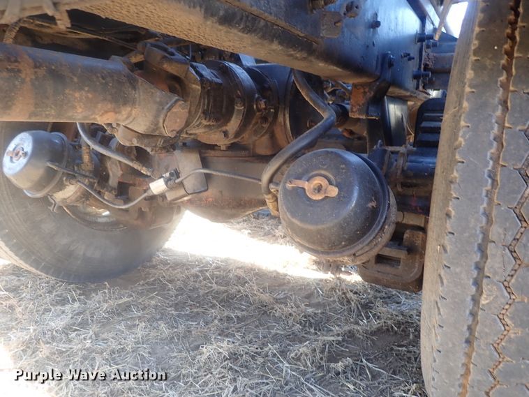 image for item DI7354 2003 Mack CV713  roll-off container truck