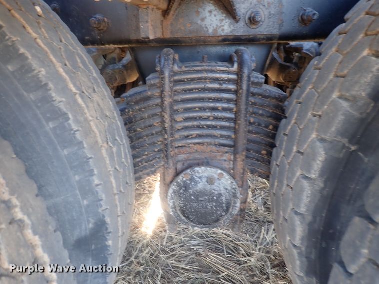 image for item DI7354 2003 Mack CV713  roll-off container truck