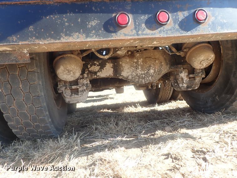 image for item DI7354 2003 Mack CV713  roll-off container truck