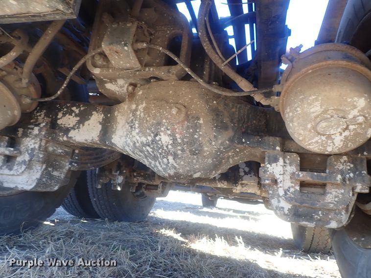 image for item DI7354 2003 Mack CV713  roll-off container truck