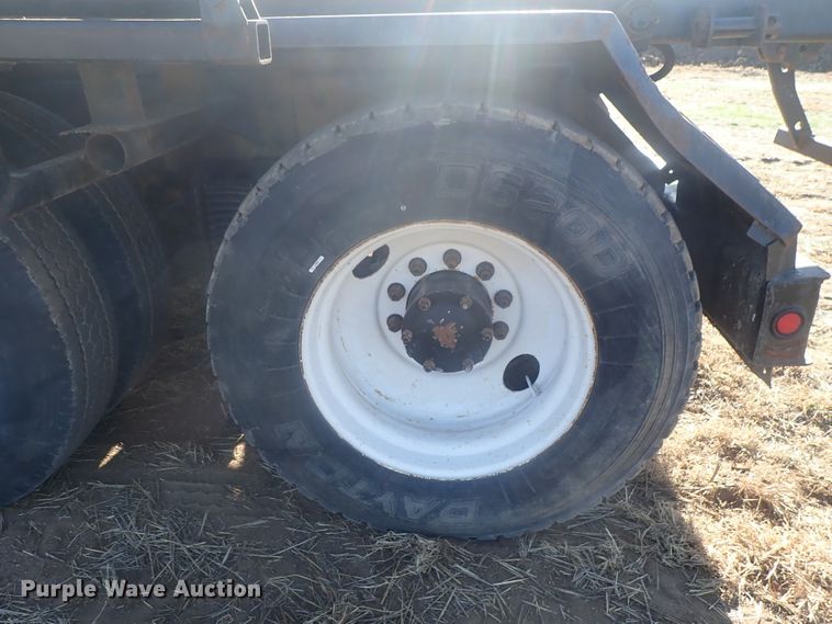 image for item DI7354 2003 Mack CV713  roll-off container truck