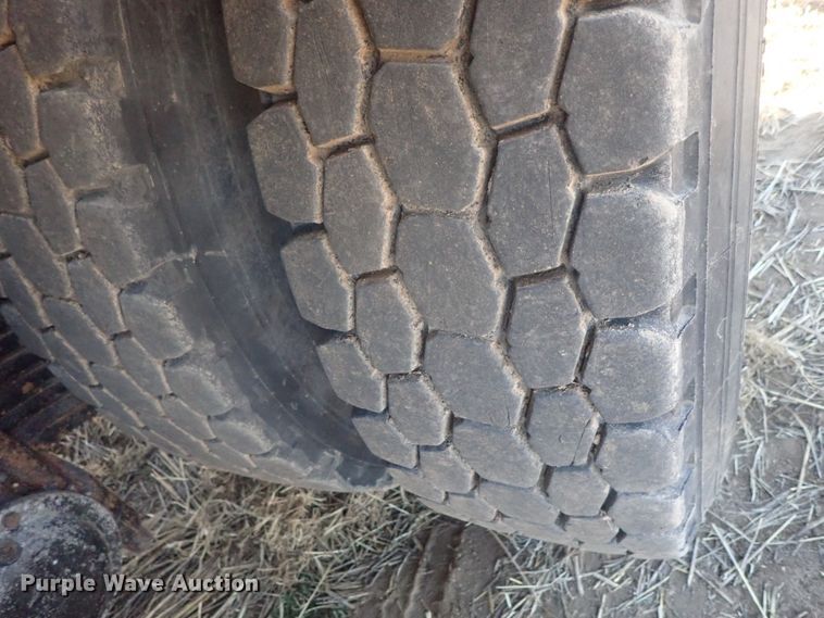 image for item DI7354 2003 Mack CV713  roll-off container truck