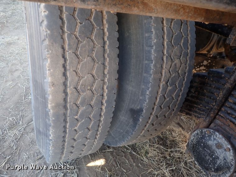 image for item DI7354 2003 Mack CV713  roll-off container truck