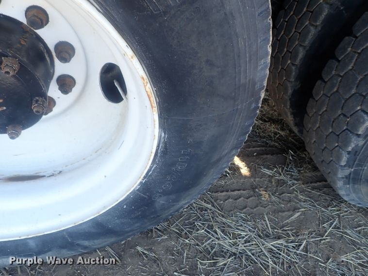 image for item DI7354 2003 Mack CV713  roll-off container truck