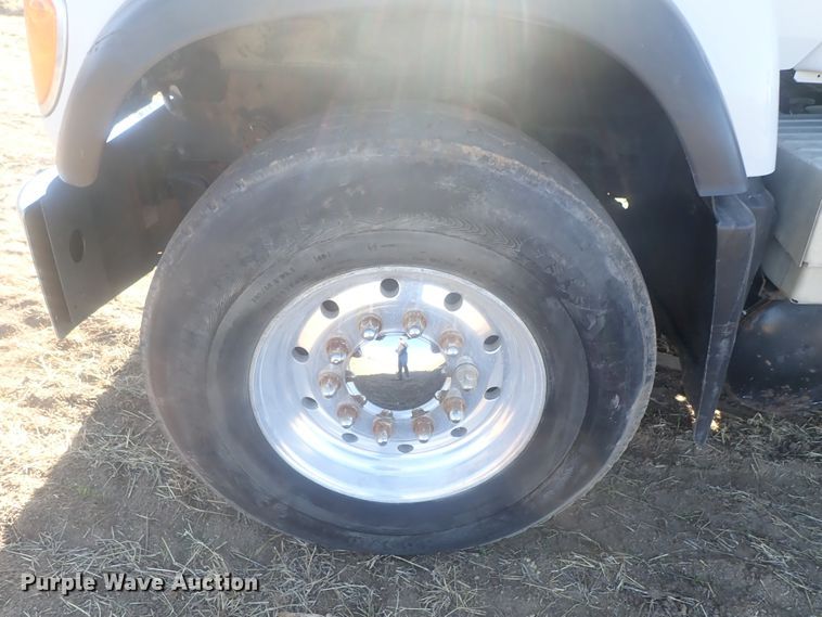 image for item DI7354 2003 Mack CV713  roll-off container truck