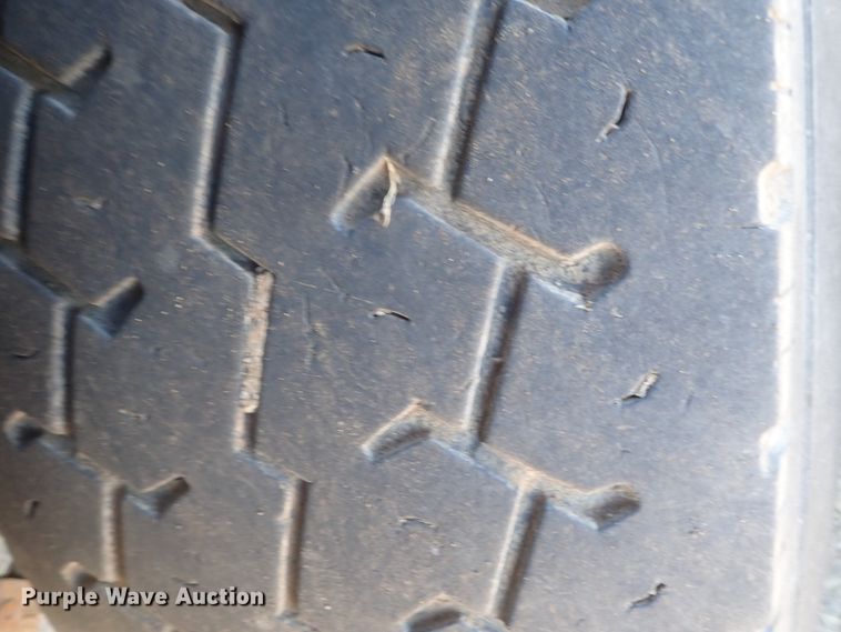 image for item DI7354 2003 Mack CV713  roll-off container truck