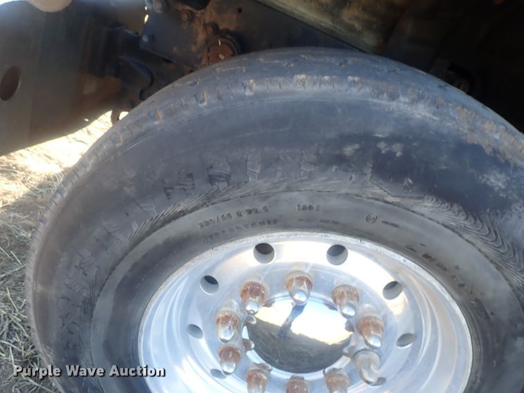 image for item DI7354 2003 Mack CV713  roll-off container truck