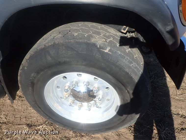 image for item DI7354 2003 Mack CV713  roll-off container truck