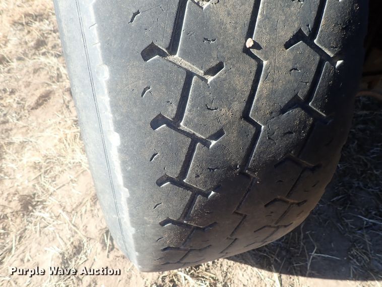 image for item DI7354 2003 Mack CV713  roll-off container truck