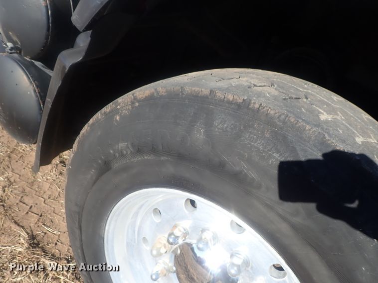 image for item DI7354 2003 Mack CV713  roll-off container truck