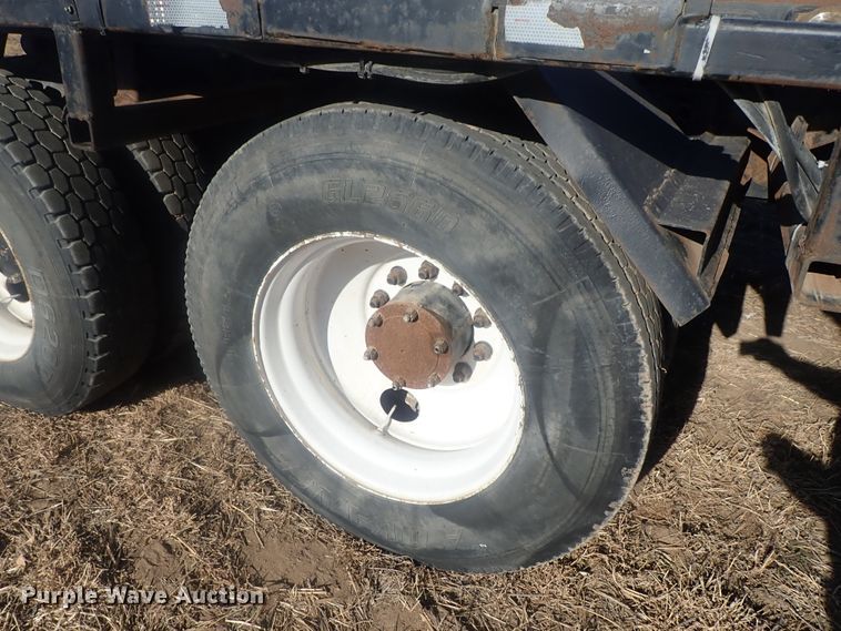 image for item DI7354 2003 Mack CV713  roll-off container truck