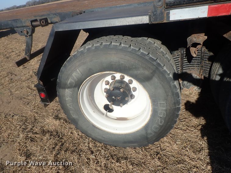 image for item DI7354 2003 Mack CV713  roll-off container truck