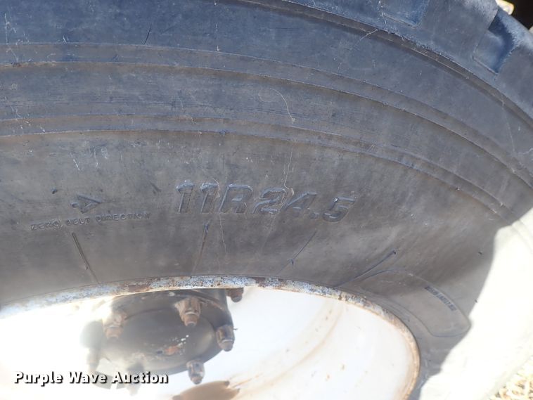 image for item DI7354 2003 Mack CV713  roll-off container truck