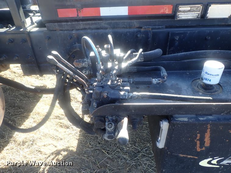 image for item DI7354 2003 Mack CV713  roll-off container truck