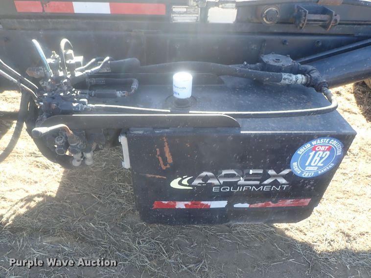 image for item DI7354 2003 Mack CV713  roll-off container truck