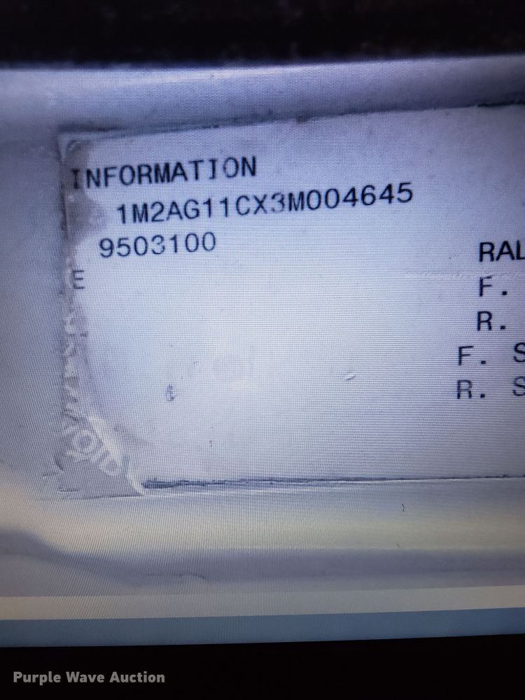 image for item DI7354 2003 Mack CV713  roll-off container truck