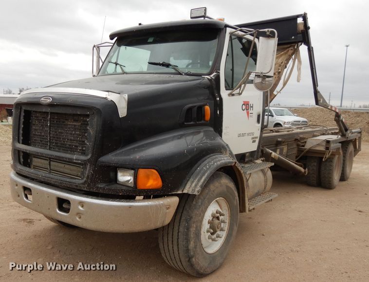 image for item DI8010 1999 Sterling Acterra  roll-off container truck