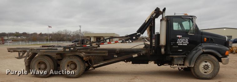 image for item DI8010 1999 Sterling Acterra  roll-off container truck