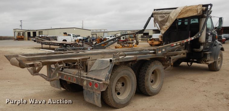 image for item DI8010 1999 Sterling Acterra  roll-off container truck