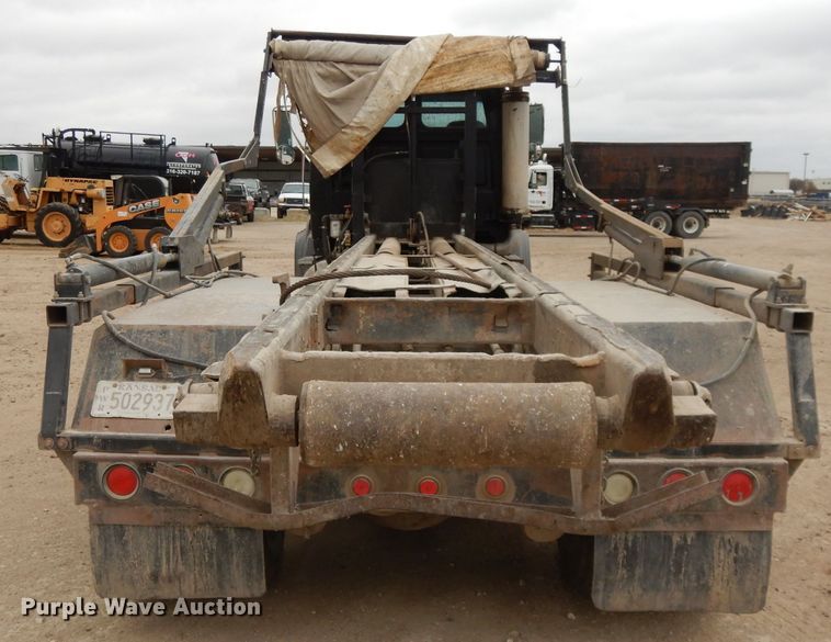 image for item DI8010 1999 Sterling Acterra  roll-off container truck