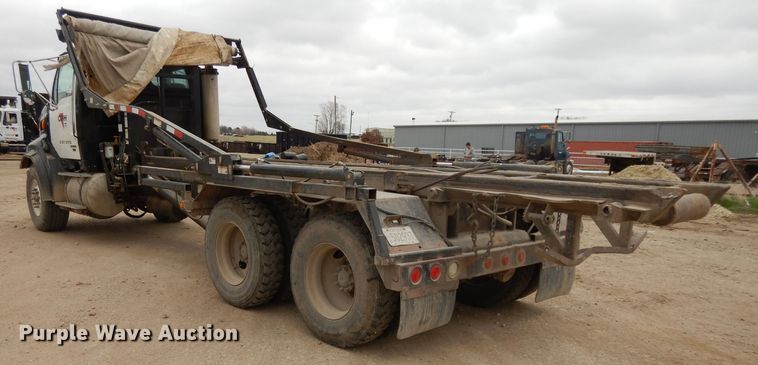 image for item DI8010 1999 Sterling Acterra  roll-off container truck