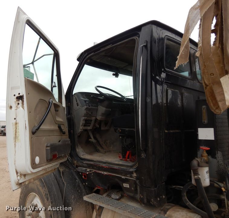 image for item DI8010 1999 Sterling Acterra  roll-off container truck