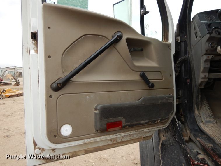 image for item DI8010 1999 Sterling Acterra  roll-off container truck