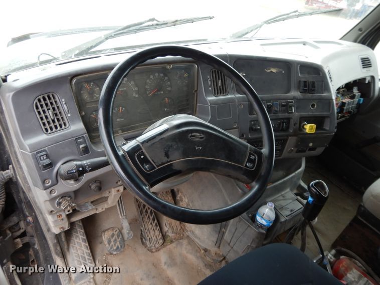 image for item DI8010 1999 Sterling Acterra  roll-off container truck