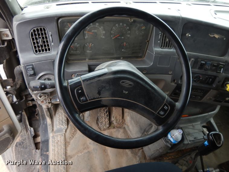 image for item DI8010 1999 Sterling Acterra  roll-off container truck