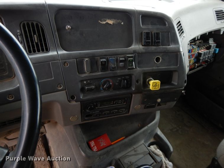 image for item DI8010 1999 Sterling Acterra  roll-off container truck