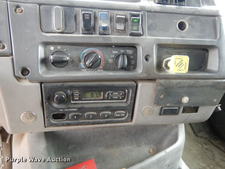 image for item DI8010 1999 Sterling Acterra  roll-off container truck