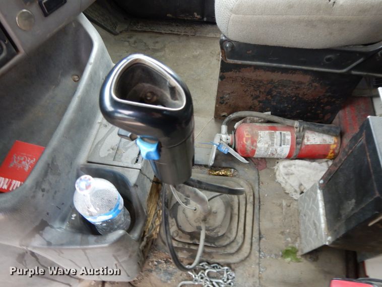 image for item DI8010 1999 Sterling Acterra  roll-off container truck