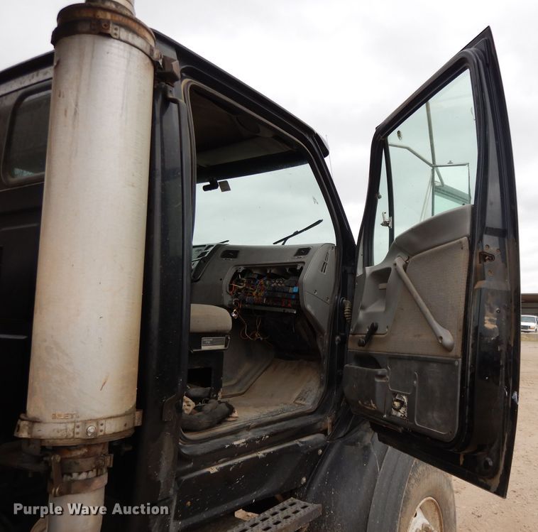 image for item DI8010 1999 Sterling Acterra  roll-off container truck