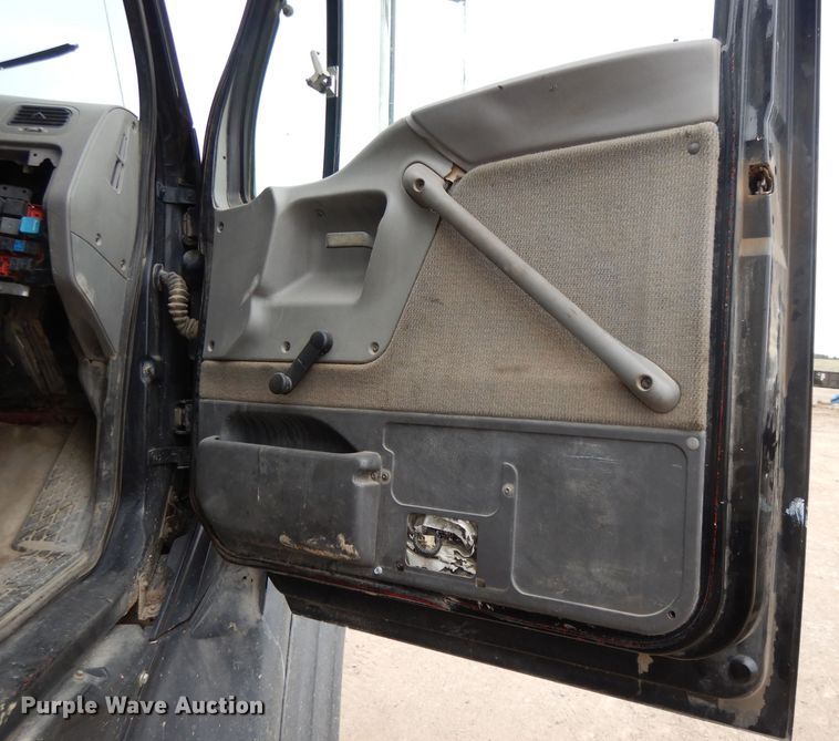 image for item DI8010 1999 Sterling Acterra  roll-off container truck