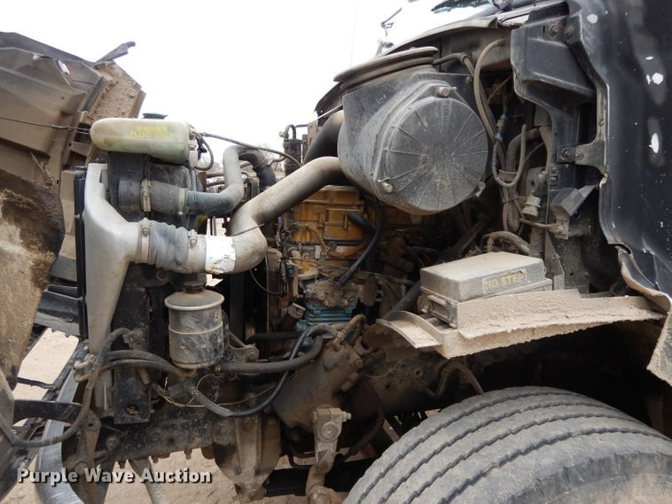 image for item DI8010 1999 Sterling Acterra  roll-off container truck