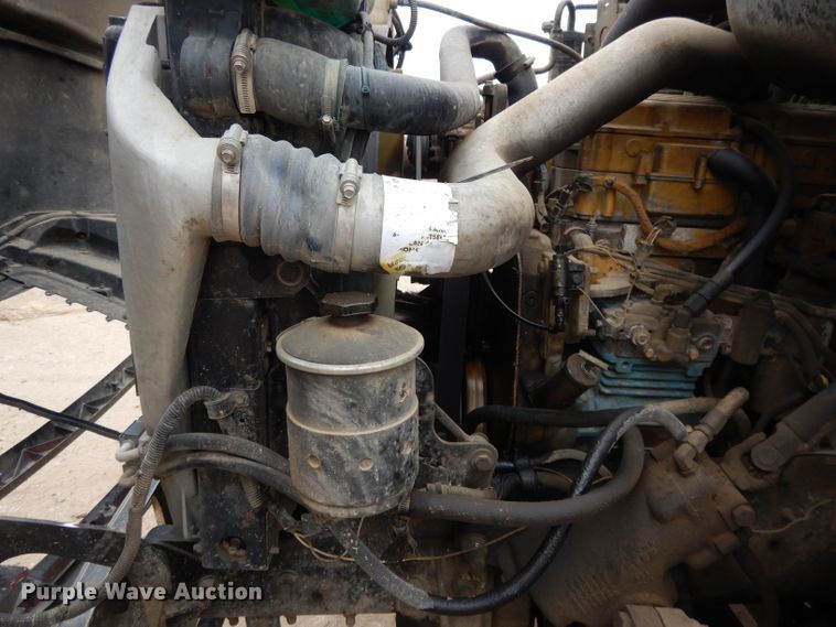 image for item DI8010 1999 Sterling Acterra  roll-off container truck