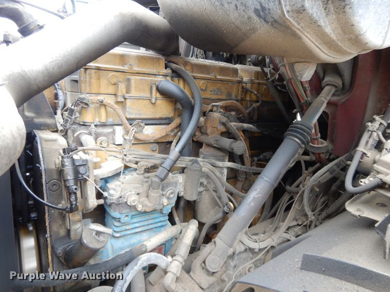 image for item DI8010 1999 Sterling Acterra  roll-off container truck