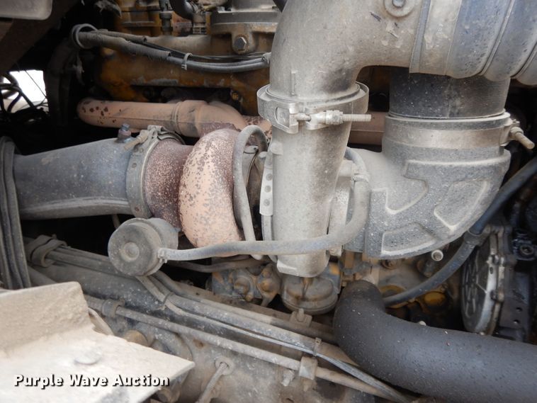 image for item DI8010 1999 Sterling Acterra  roll-off container truck