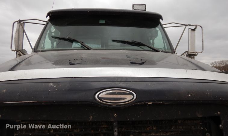 image for item DI8010 1999 Sterling Acterra  roll-off container truck