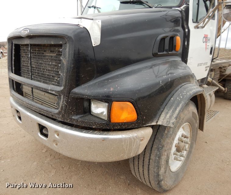 image for item DI8010 1999 Sterling Acterra  roll-off container truck