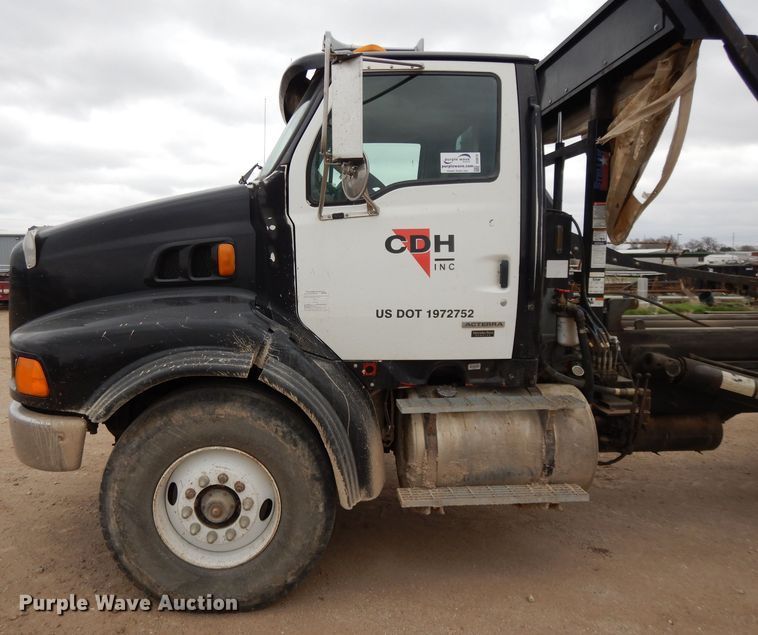 image for item DI8010 1999 Sterling Acterra  roll-off container truck