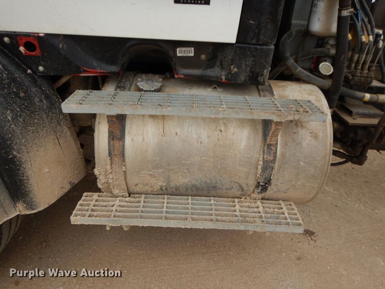 image for item DI8010 1999 Sterling Acterra  roll-off container truck