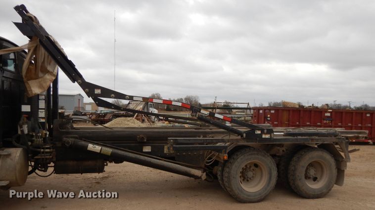 image for item DI8010 1999 Sterling Acterra  roll-off container truck