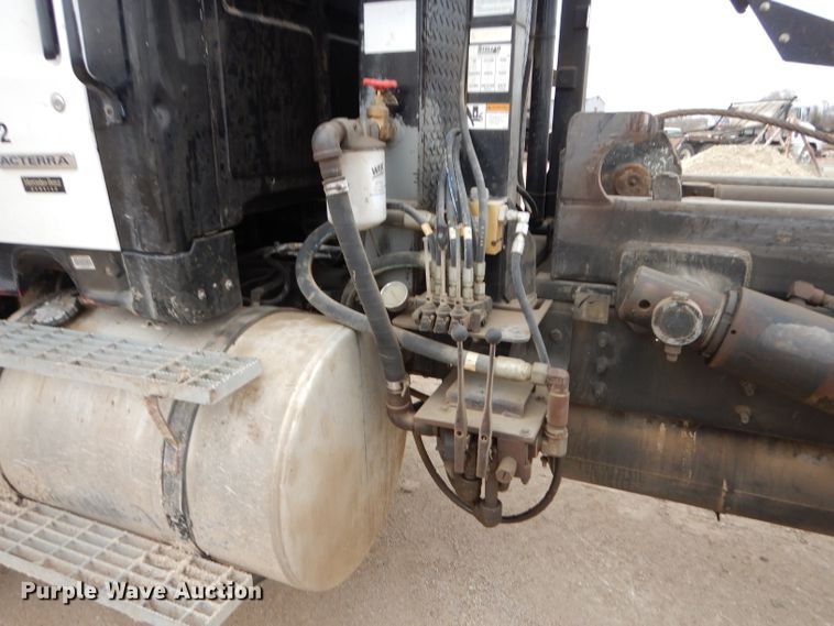 image for item DI8010 1999 Sterling Acterra  roll-off container truck