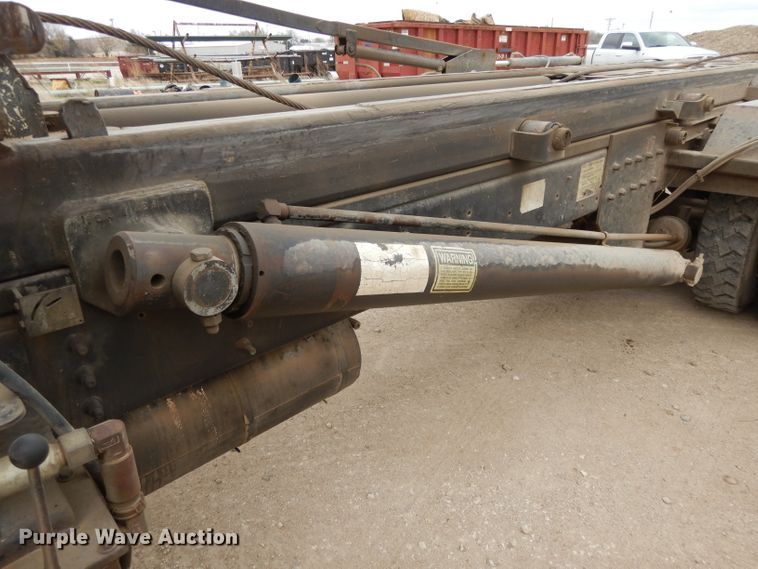 image for item DI8010 1999 Sterling Acterra  roll-off container truck