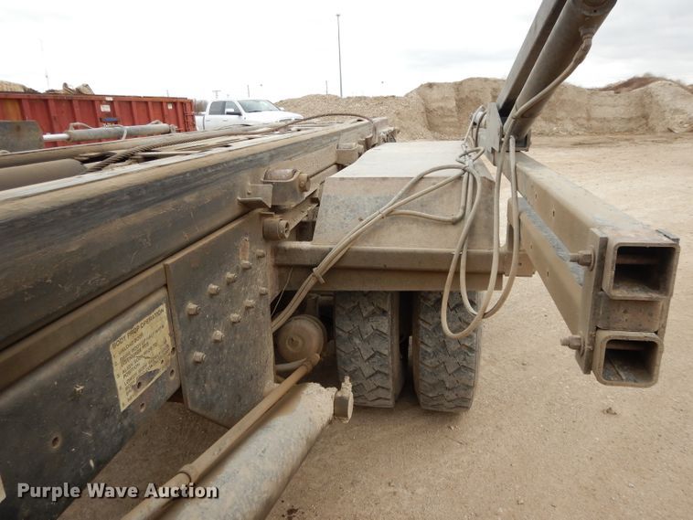 image for item DI8010 1999 Sterling Acterra  roll-off container truck