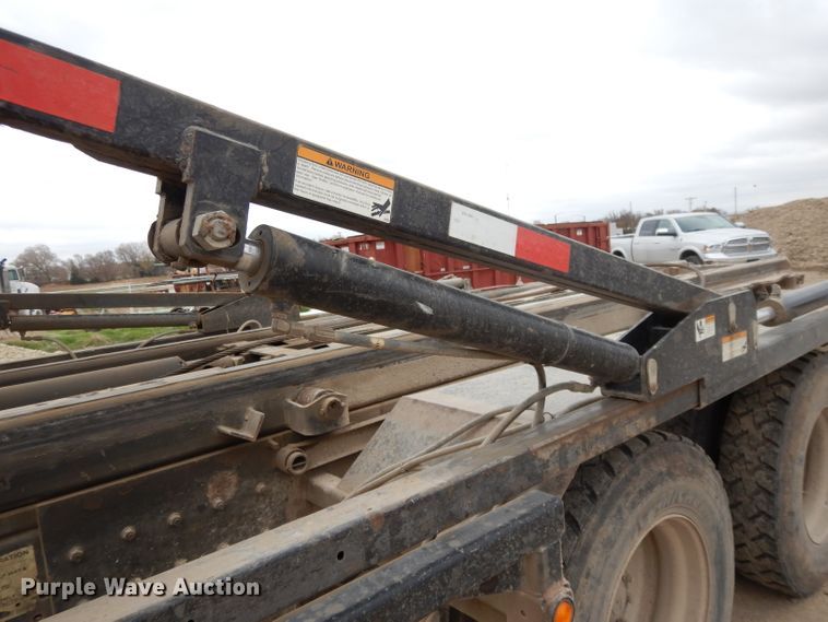 image for item DI8010 1999 Sterling Acterra  roll-off container truck